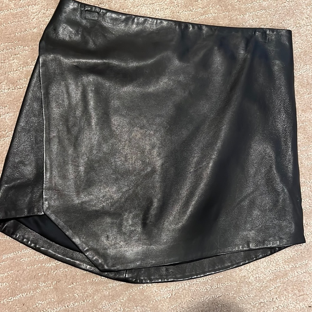Brand new, with tags Michelle Mason leather skirt, size zero